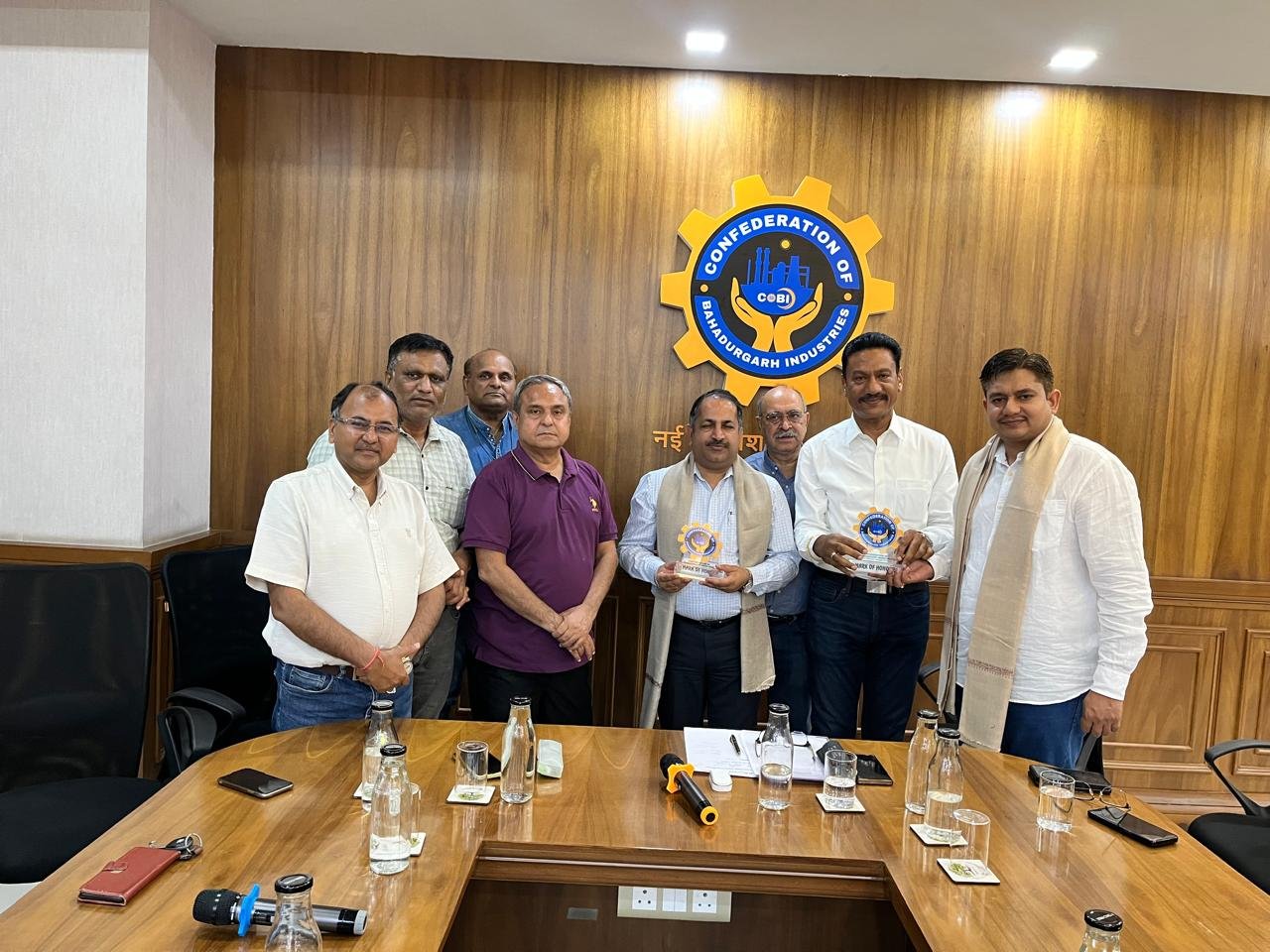 A meeting with UHBVNL & HVPNL officials held at COBI Office